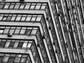 Tilted windows of many-storied building architecture backdrop
