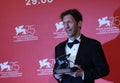 Tim Blake Nelson poses with the Best Screenplay Award Royalty Free Stock Photo