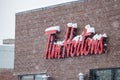 Tim Hortons Sign on Building in Canadian Witner Royalty Free Stock Photo