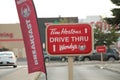 tor, canada - august 10, 2023: tim hortons wendys drive thru sign on post with breakfast wendys restaurant logo. p Royalty Free Stock Photo