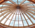 Timber beams of a roof forming a circular skylight Royalty Free Stock Photo