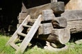 Timber footing beams placed on stone supports, corner detail to rural house