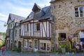 Timber frame medieval houses in cobblestoned street in Dinan Royalty Free Stock Photo