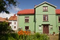 Timber green house and back garden. Vadstena. Sweden Royalty Free Stock Photo