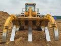 Timber loader on the loading dock closeup. Front view Royalty Free Stock Photo