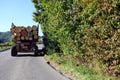 Timber trucks on a mountain road.