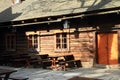 Timbered house with benches and tables Royalty Free Stock Photo