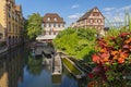 Timbered houses and canal with excursion boats in Little Venice, La Petite Venise, Colmar, Alsace, France. Royalty Free Stock Photo