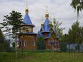 Timbered Orthodox chapel with gold domes