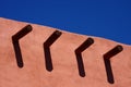 Timbers in Adobe Wall Under Blue Sky Royalty Free Stock Photo