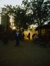 Timbuktu, Mali, Africa - February 2, 2008: Man walking behind the market through the sand