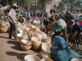 Timbuktu, Mali, Africa - February 3, 2008: People selling and buying at town market