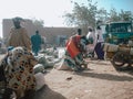 Timbuktu, Mali, Africa - February 3, 2008: People selling and buying at town market