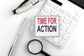 TIME FOR ACTION text on the sticker with calculator, glasses and magnifier Royalty Free Stock Photo
