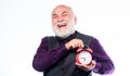 Time and age concept. Bearded man clock ticking. Aged man holding alarm clock. Lifetime ageing and getting older. Senior