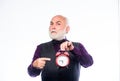 Time and age. Timekeeping. retirement. watchmaker or watch repairer. mature man with beard clock show time. time