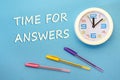 TIME FOR ANSWERS - lettering on a blue background and clock