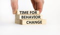 Time for behavior change symbol. Concept words `Time for behavior change` on wooden blocks. Businessman hand. Beautiful white