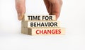 Time for behavior changes symbol. Concept words `Time for behavior changes` on wooden blocks. Businessman hand. Beautiful white