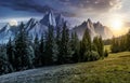 Time change concept over forest and rocky peaks Royalty Free Stock Photo