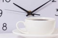 Time for a coffee break, work with coffee cup and clock at ten o clock on white Royalty Free Stock Photo