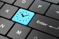 Time concept: Clock on computer keyboard background Royalty Free Stock Photo