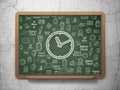 Time concept: Clock on School Board background Royalty Free Stock Photo