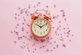 Time concept. stylish vintage alarm clock on pink background wit Royalty Free Stock Photo