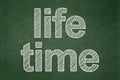 Time concept: Life Time on chalkboard background Royalty Free Stock Photo
