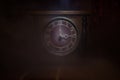 Time Concept - Vintage Wood Clock Face With Grunge Texture At Dark Red Maroon Curtain Background, Three O Clock With Smoke