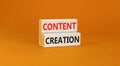 Time for content creation symbol. Concept words Content creation on beautiful wooden block. Beautiful orange table orange