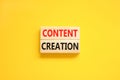 Time for content creation symbol. Concept words Content creation on beautiful wooden block. Beautiful yellow table yellow