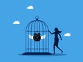 Time control. woman locks a clock in a birdcage. business concept Royalty Free Stock Photo