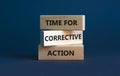 Time for corrective action symbol. Wooden blocks with words `Time for corrective action` on a beautiful grey background. Busines Royalty Free Stock Photo