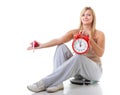 Time for diet slimming. Large girl with scale. Royalty Free Stock Photo