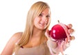 Time for diet slimming. Woman with apple and measuring tape Royalty Free Stock Photo