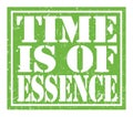 TIME IS OF ESSENCE, text written on green stamp sign