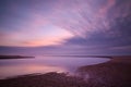 Time exposure of Siltcoos River and moving clouds