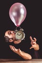 Time flies concept - picture of a man in panic trying to grab an old metal clock Royalty Free Stock Photo