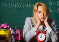 Time is gone. teacher with alarm clock at blackboard. Time. Back to school. Teachers day. Study and education. Modern Royalty Free Stock Photo