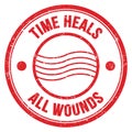 TIME HEALS ALL WOUNDS text on red round postal stamp sign