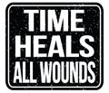 TIME HEALS ALL WOUNDS, words on black stamp sign