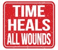 TIME HEALS ALL WOUNDS, words on red stamp sign