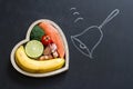 Time for health heart abstract diet food concept on blackboard with bell Royalty Free Stock Photo