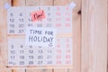 Time For Holiday written on paper note on a wall calendar Royalty Free Stock Photo