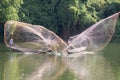 Landscape photo: fishermen casting fishing nets on Nhu Y river