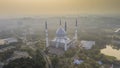 aerial view of beautiful modern architecture mosque located in selangor, malaysia during sunrise
