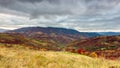 Time lapse Beautiful autumn nature and mist foggy flows around the mountains in the morning with mild sunshine. Autumn Royalty Free Stock Photo