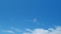 Blue sky soft silky clouds. Background of sky and clouds. Cirrus clouds in blear bright summer day. Time lapse.