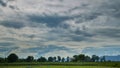 Time-lapse cloud before storm above summer landscape Royalty Free Stock Photo